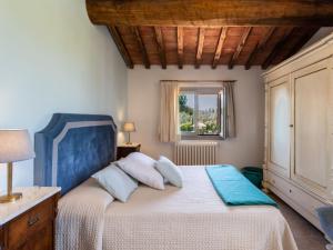 מיטה או מיטות בחדר ב-Villa Meletta by Interhome