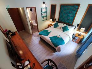 Postel nebo postele na pokoji v ubytování Village Hideaways & Spas