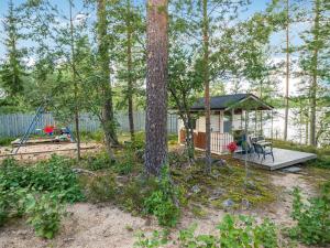 Κήπος έξω από το Holiday Home Kissankulma by Interhome