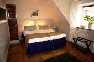 Voodi või voodid majutusasutuse Kivikstrand Badhotell toas
