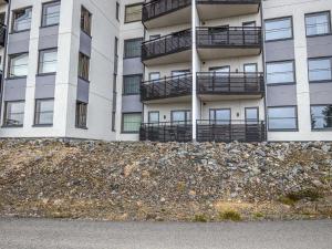 a building with balconies on the side of it at Holiday Home Nordic chalet 9102 by Interhome in Ylläsjärvi