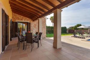 A patio or other outdoor area at Villa Sa Torre