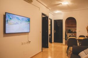 TV a/nebo společenská místnost v ubytování Aparthotel Costa Blanca
