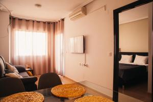 TV a/nebo společenská místnost v ubytování Aparthotel Costa Blanca