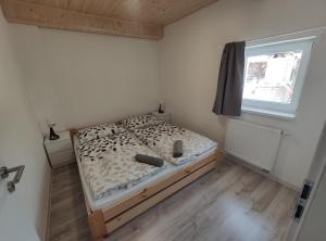 Posteľ alebo postele v izbe v ubytovaní Apartmány PRO LIPNO