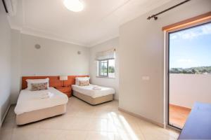 Postel nebo postele na pokoji v ubytování Villa Albufeira by Atlantic Places + 37 fotografií