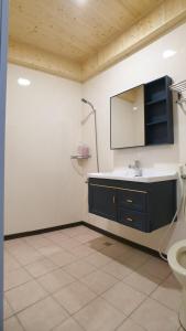 Vannituba majutusasutuses Duo Yuan Hua B&B