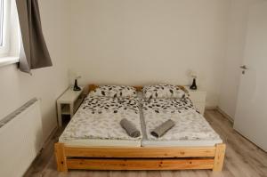 Posteľ alebo postele v izbe v ubytovaní Apartmány PRO LIPNO