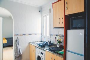 Kuchyň nebo kuchyňský kout v ubytování Aparthotel Costa Blanca