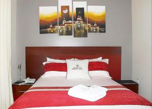 Postel nebo postele na pokoji v ubytování Hotel Tababela Land