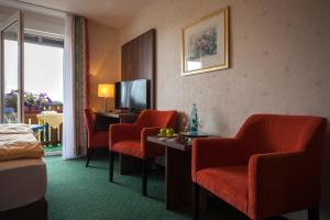 Posezení v ubytování Hotel Berghof + 15 fotografií