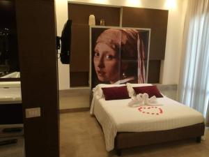 Postel nebo postele na pokoji v ubytování B&B Suite Paciotti