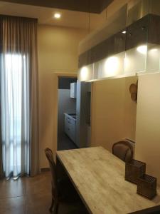 Kuchyň nebo kuchyňský kout v ubytování B&B Suite Paciotti