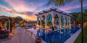 an image of a swimming pool at a resort at Pedra da Laguna Boutique Hotel SPA in Búzios