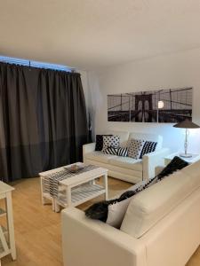 Posezení v ubytování Apartamento en la Playa The Tides
