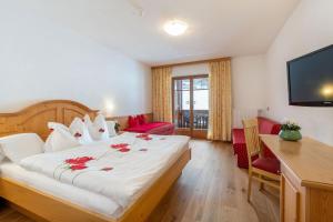 Voodi või voodid majutusasutuse Hotel Lindnerhof toas