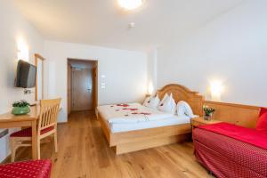 Voodi või voodid majutusasutuse Hotel Lindnerhof toas
