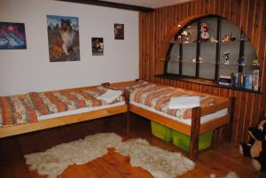 Posteľ alebo postele v izbe v ubytovaní Chalet Lucie