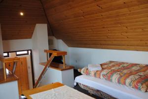 Posteľ alebo postele v izbe v ubytovaní Chalet Lucie