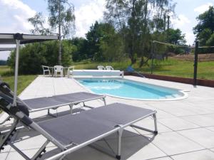 Bazén v ubytování Holiday Home Žlábek nebo v jeho okolí