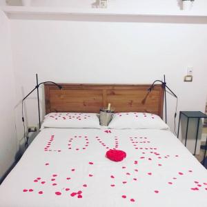 Postel nebo postele na pokoji v ubytování B&B Porto Trani