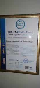 a picture of a sign on a wall at Garni hotel Vir in Vrnjačka Banja