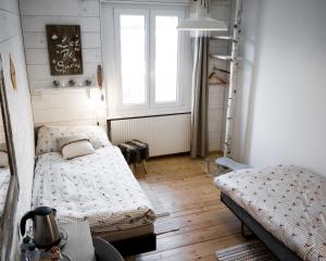 Postel nebo postele na pokoji v ubytování Vent_du_Nord