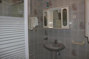 Kúpeľňa v ubytovaní Cedar Apartment 2