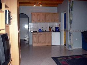 A kitchen or kitchenette at Pine Wood Apartment 7