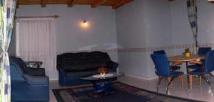 A seating area at Pine Wood Apartment 7