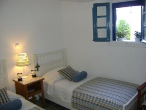 Cama ou camas em um quarto em Chez Semiramis The Sun Touch House for 8 persons 5'min from the beach