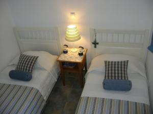 Cama ou camas em um quarto em Chez Semiramis The Sun Touch House for 8 persons 5'min from the beach