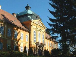 a large building with a dome on top of it at Holiday home- Galóca in Helesfa