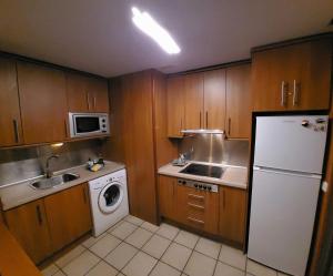 Kuchyň nebo kuchyňský kout v ubytování Esquinzo Residenzial + 18 fotografií