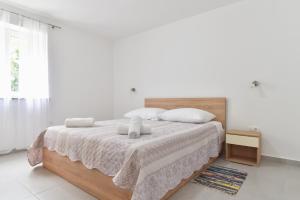 Postel nebo postele na pokoji v ubytování Sandy beach apartments