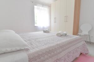 Postel nebo postele na pokoji v ubytování Sandy beach apartments