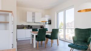 Kuchyň nebo kuchyňský kout v ubytování Apartmenthaus Wittsande Wittsande 10