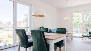 Posezení v ubytování Apartmenthaus Wittsande Wittsande 10