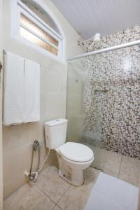 
Um banheiro em OYO Pousada Recanto Shangrilá, Cabo Frio
