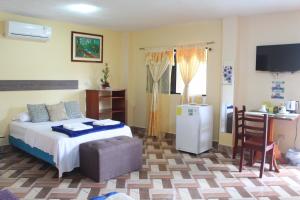 Voodi või voodid majutusasutuse Hostal Romy toas