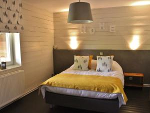 Katil atau katil-katil dalam bilik di Holiday Home in Jupille near Forest Trails
