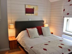 Katil atau katil-katil dalam bilik di Holiday Home in Jupille near Forest Trails