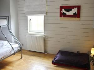 Ruang duduk di Holiday Home in Jupille near Forest Trails