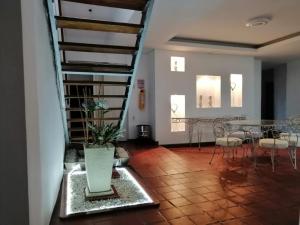 Posezení v ubytování Hotel 42 Avenida