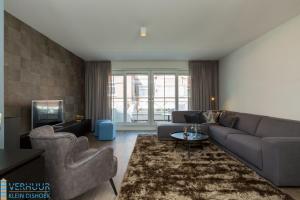 Posezení v ubytování Appartement - Kaapduinseweg 13 Dishoek 13F Luxe 6 personen
