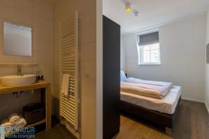 Postel nebo postele na pokoji v ubytování Appartement - Kaapduinseweg 13 Dishoek 13F Luxe 6 personen