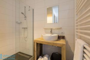Koupelna v ubytování Appartement - Kaapduinseweg 13 Dishoek 13F Luxe 6 personen