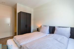 Postel nebo postele na pokoji v ubytování Appartement - Kaapduinseweg 13 Dishoek 13F Luxe 6 personen
