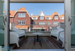 Posezení v ubytování Appartement - Kaapduinseweg 13 Dishoek 13F Luxe 6 personen