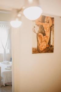 Llit o llits en una habitació de Piazza Argento